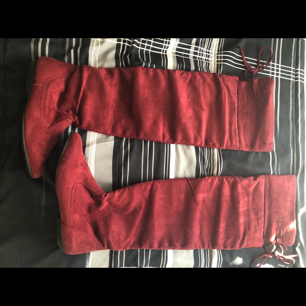 Burgundy over the knee boots.